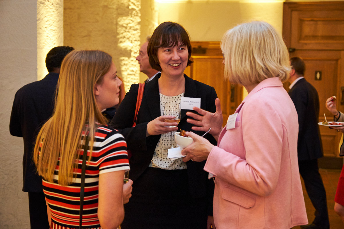 business women talking at a London event