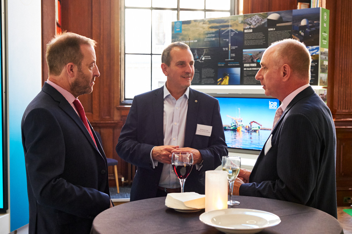 guests talking at a London event for the building industry