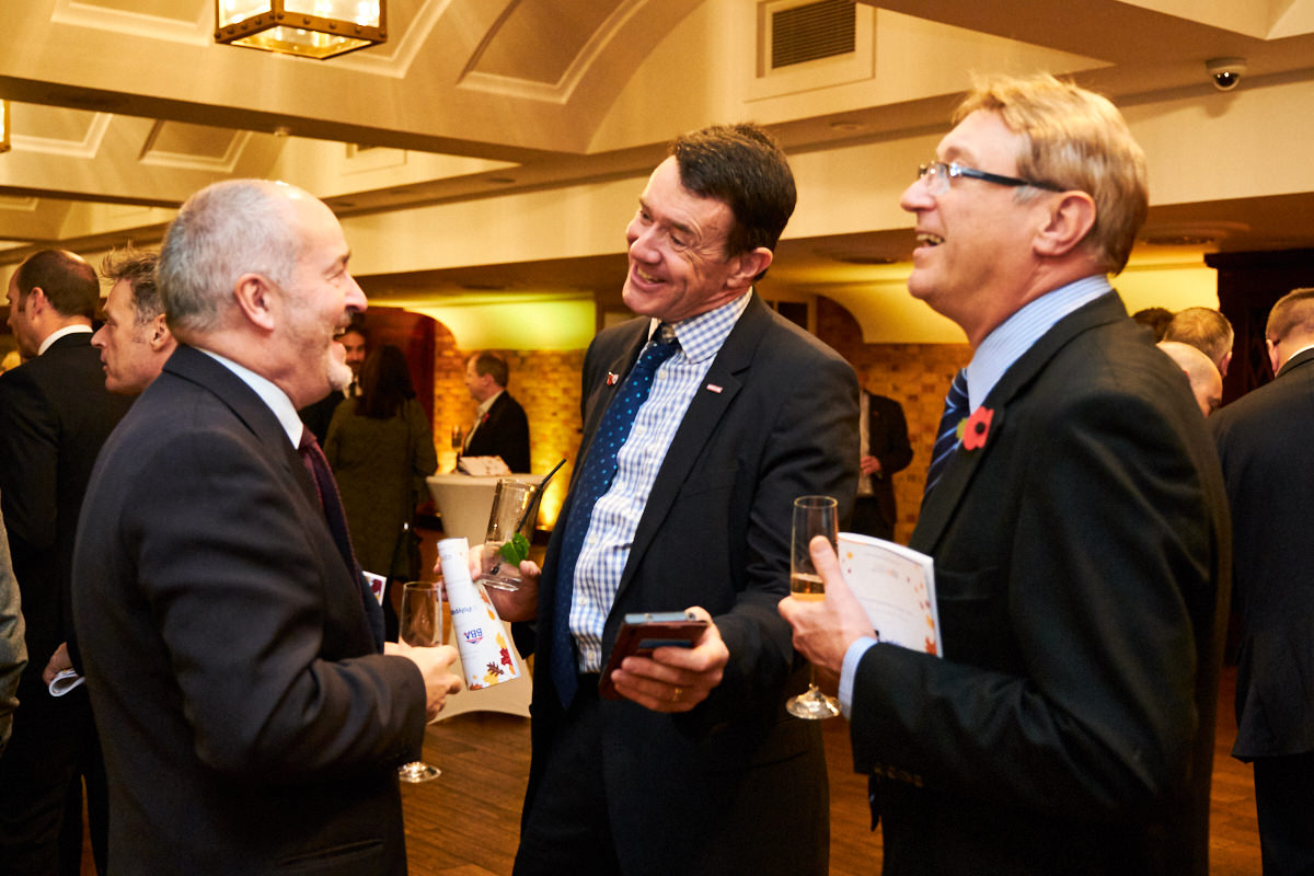 guests talking at an event photographed by a London event photographer