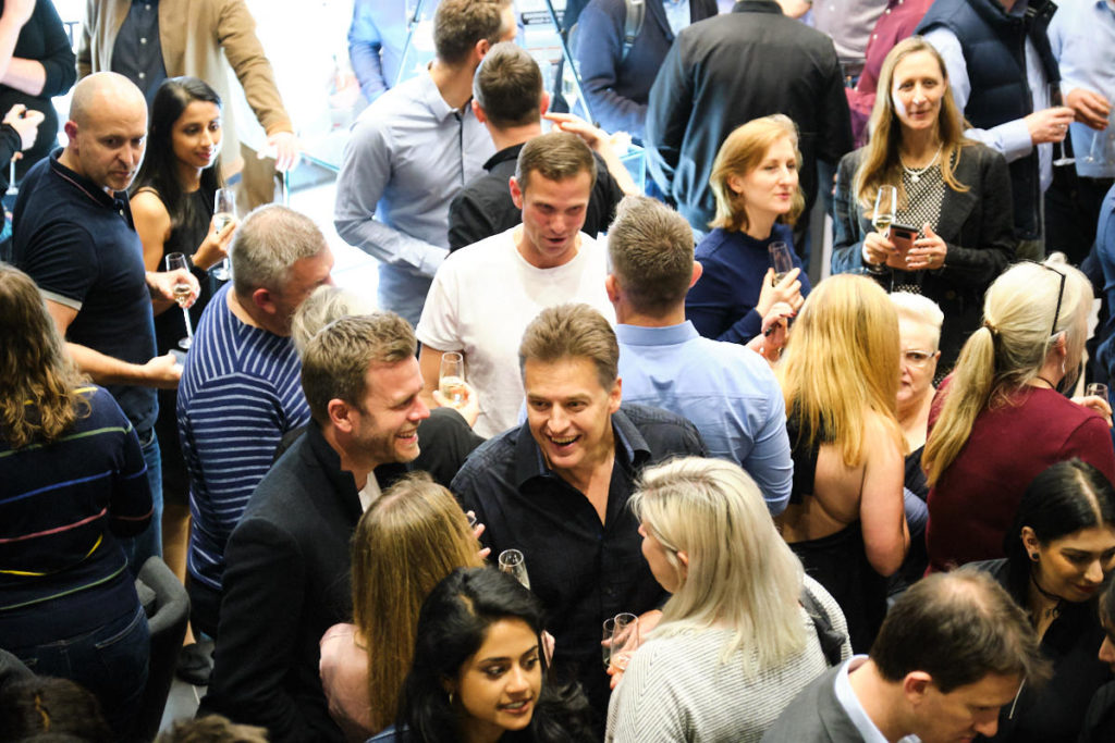 an overhead view of guests talking at an event