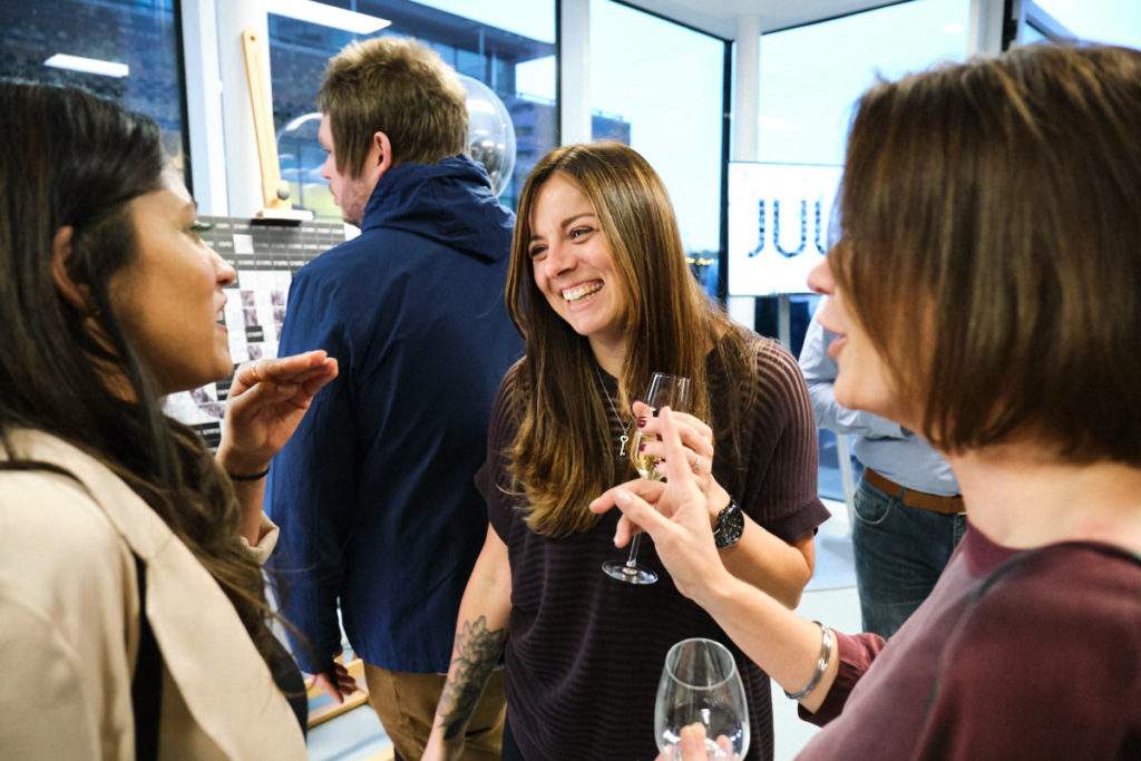 a guest at a London event laughing