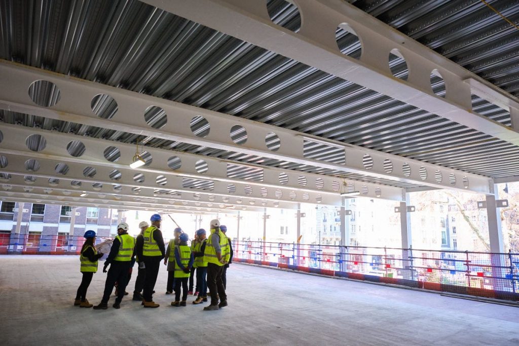 Visitors to a building site in London photographed by a corporate photographer in London